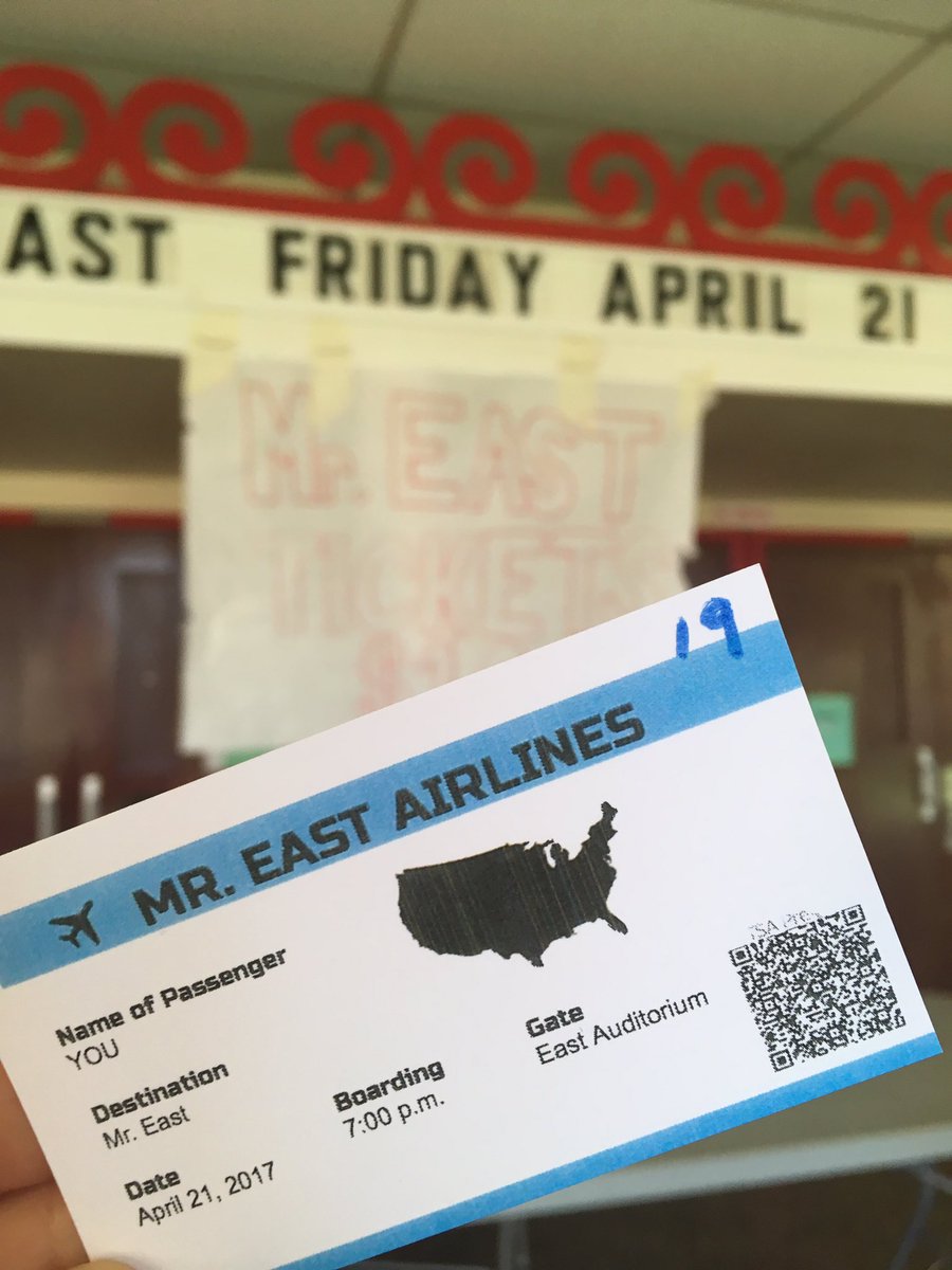 MR. EAST TICKETS R BEING RN INFRONT OF THE AUDITORIUM