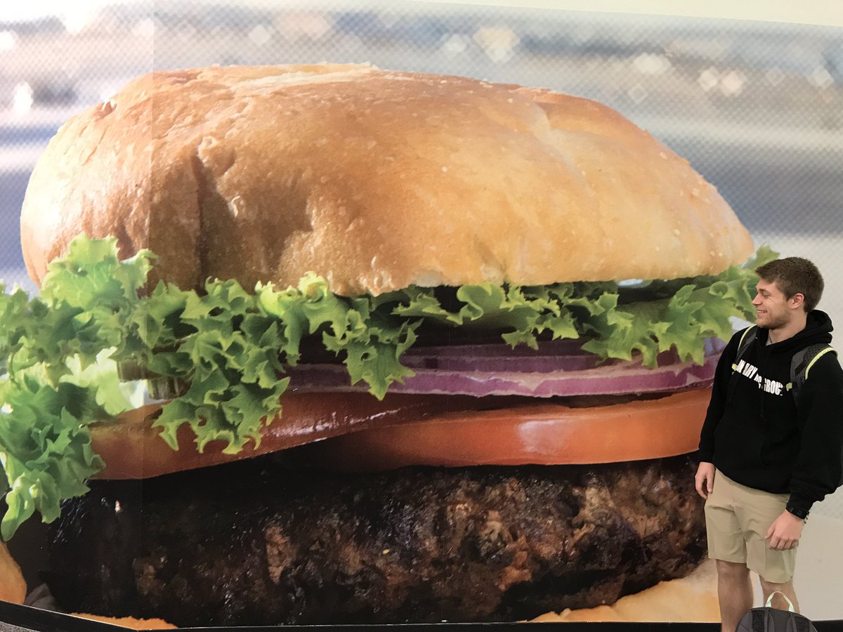 EHambuchen's tweet photo. Get you a guy that looks at you like Nathan looks at this burger https://t.co/I9EdW9xn8Z