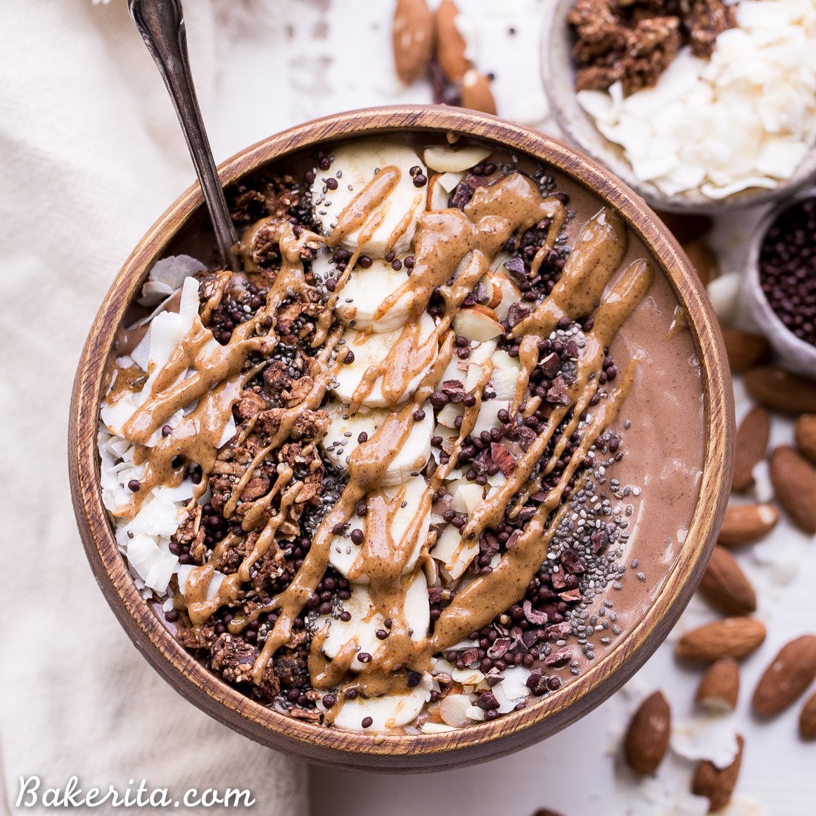 bakeritablog's tweet image. Start your day with a #GF + #Vegan Almond Chocolate Coconut Smoothie Bowl! #RECIPE: bakerita.com/almond-chocola… #TopItTuesday #ad @LoveMySilk