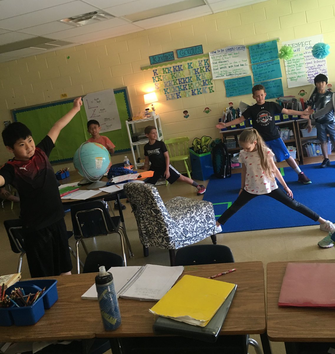MissMazz_FSES's tweet photo. These mathematicians (and I) love to move our bodies while we move our brains. Today we are human protractors! https://t.co/4PTqLXpla9