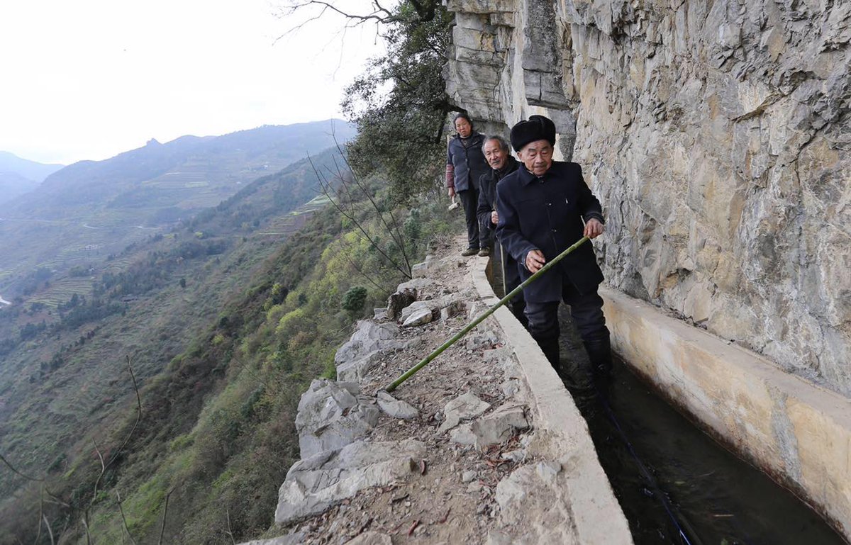 Man's will! He, together with villagers, spends 36 years digging 9400m-long water canal deep in mountains of SW China's Guizhou