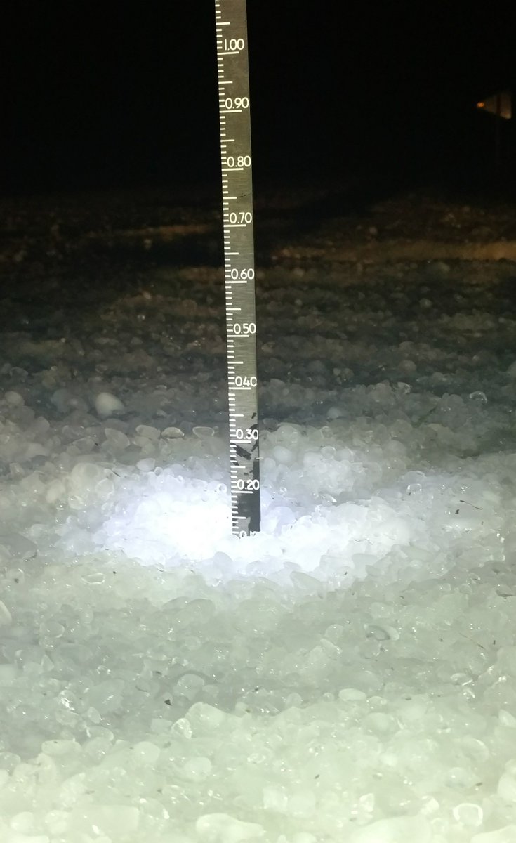 Hail covered Hwy 28 around 1044 pm Tuesday evening 2 miles north of