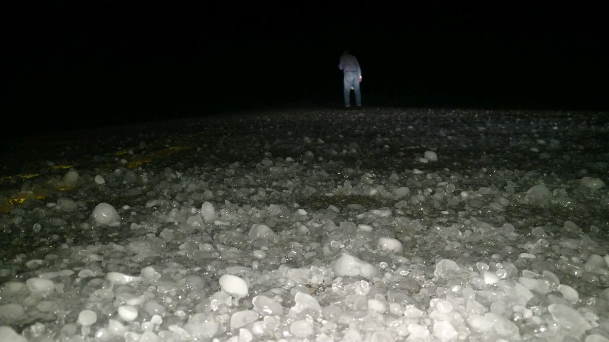 Hail covered Hwy 28 around 1044 pm Tuesday evening 2 miles north of