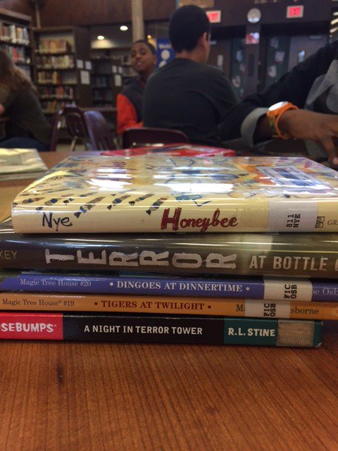 EastHillsMSLib's tweet photo. @EastHillsMSbasd @Mr_Glase pd 2 #bookspinepoetry for #poetrymonth #basdproud https://t.co/PqAhpBk72u