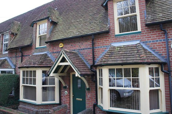 BJHwindowsLtd's tweet photo. PVC-U double glazed vertical sliding sash windows and composite door in bespoke colours. Cream &amp; Green. #SlidingSashWindows #CompositeDoors https://t.co/ttLPlLVqfn