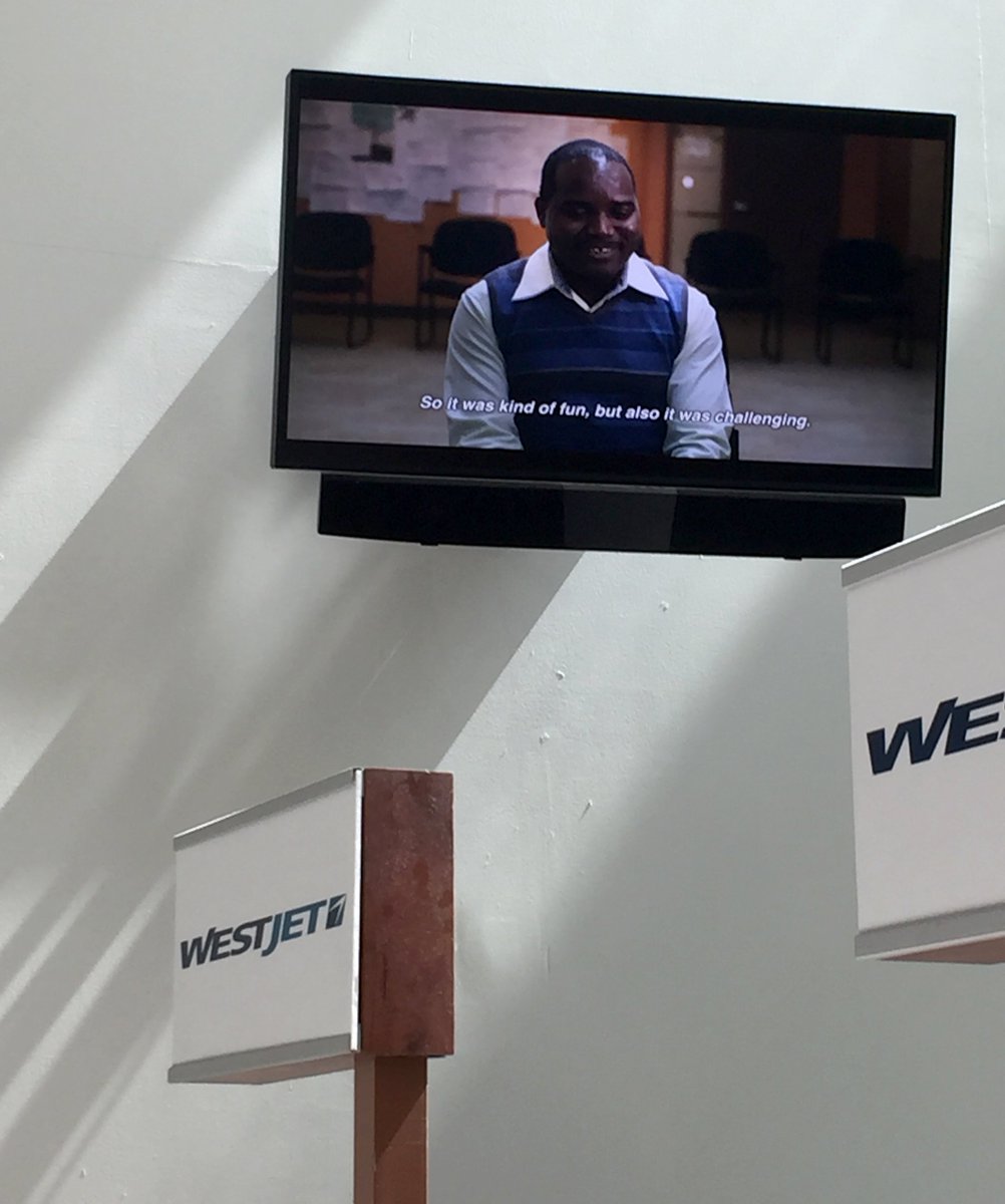 isans_ca's tweet photo. If you are passing through @HfxStanfield - look for our videos featuring former refugees sharing their stories in arrivals and departures! https://t.co/HlZm81ca4a