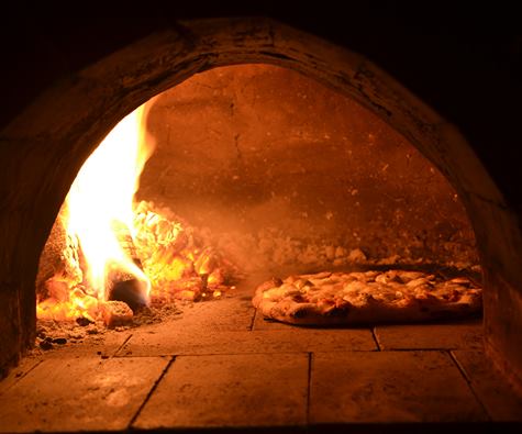 Indulge our pizza's rich flavor and warm crispy crust cooked in our traditional wood-fired oven! 
#FoodTruck #WoodFiredOven