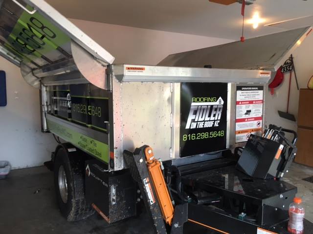 We can install vinyl graphics on unique machines. We designed, produced &amp; installed graphics on roofing machines for Fidler On The Roof KC