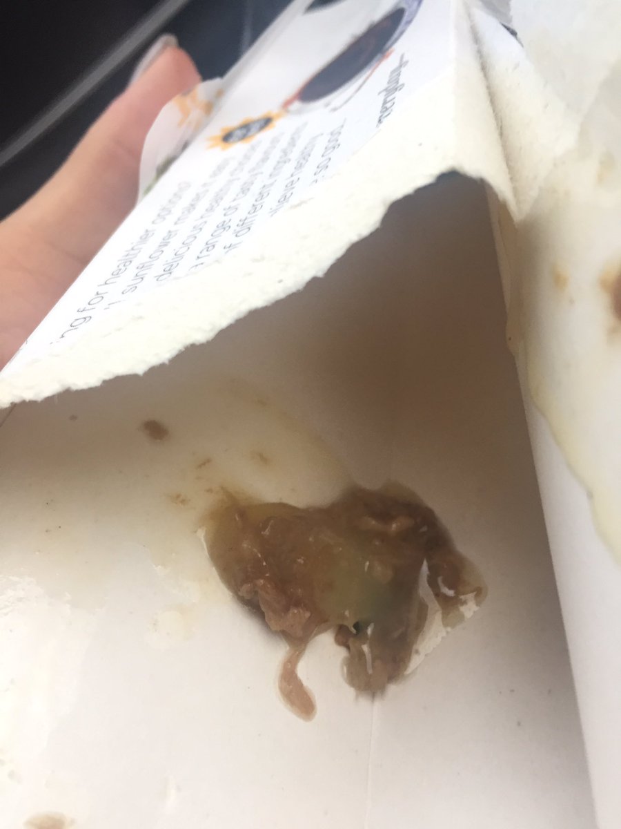 KatHounsome's tweet photo. @marksandspencer lump of lard and piece of plastic found in a duck wrap. Absolutely revolting!!!!! 🤢👎🏻 https://t.co/7y7gQKsL4n