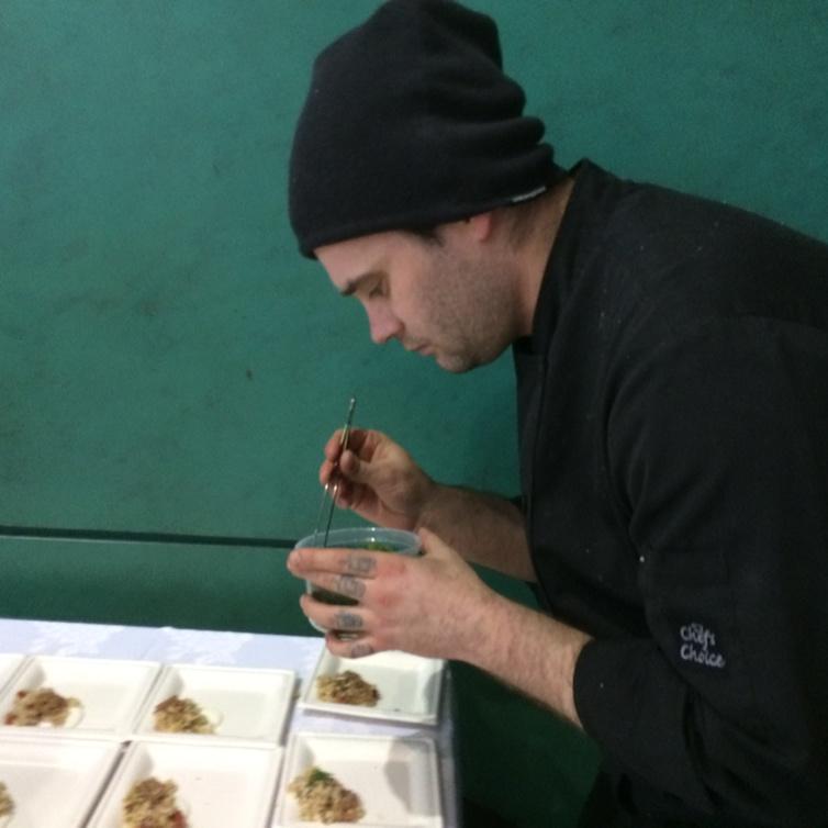 Here's @dannymongeon plating ancient grain salad at the #tasteforhope event at city hall.