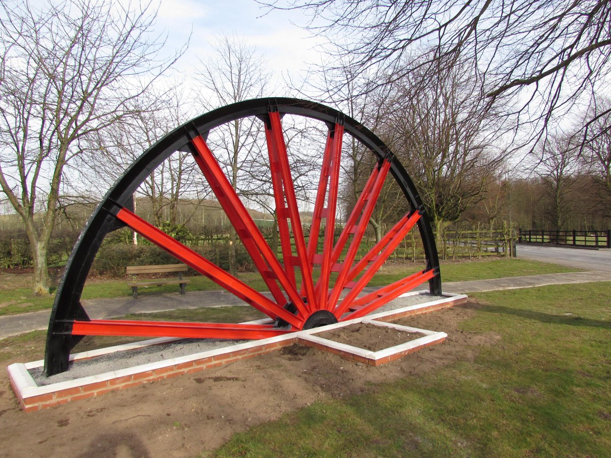 Pit wheel being painted,entrance to Pit lane,Eakring Road,Bilsthorpe.