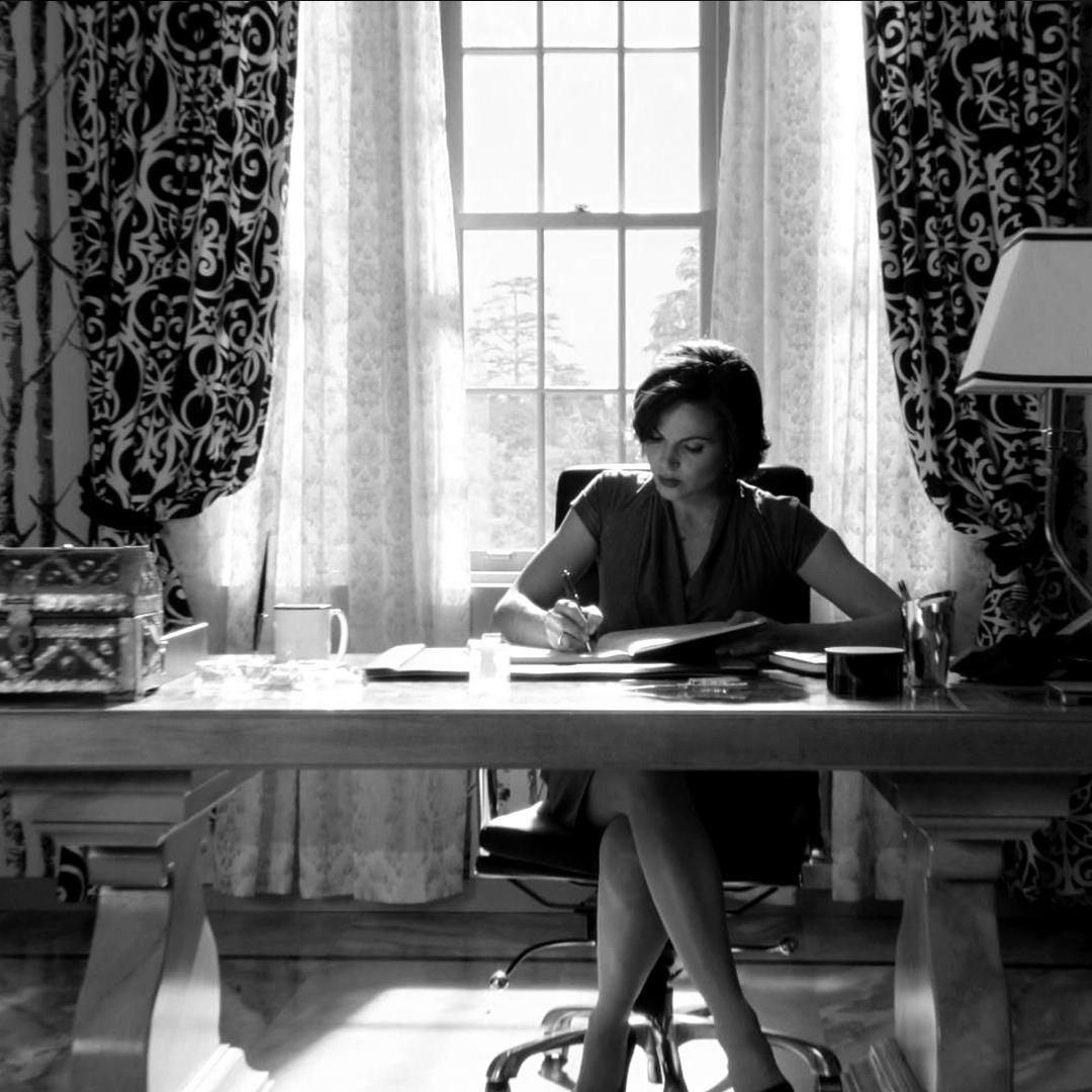 Regina ran a hand through her hair as she flipped through the thousand of pages that crowded her desk. "Work work--