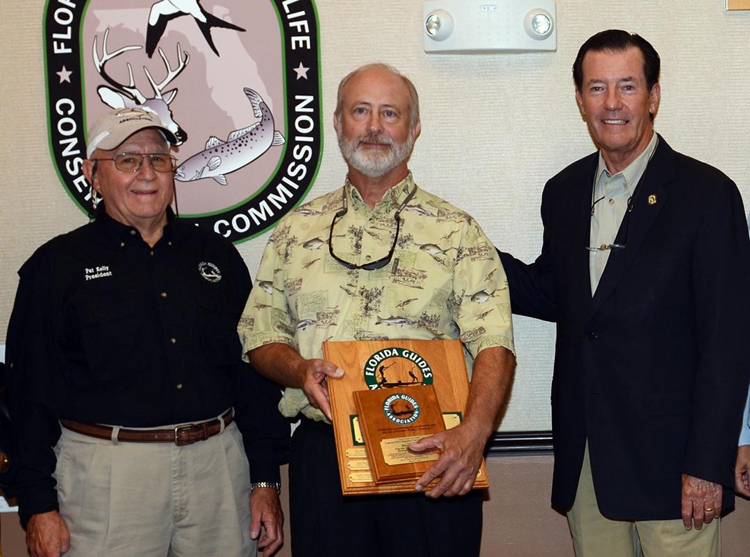 FloridaBassMag's tweet photo. @MyFWC scientist Wes Porak (center) recognized for contributions to bass research. http://t.co/94Y02oXDu9 http://t.co/RhM98J6Zs2