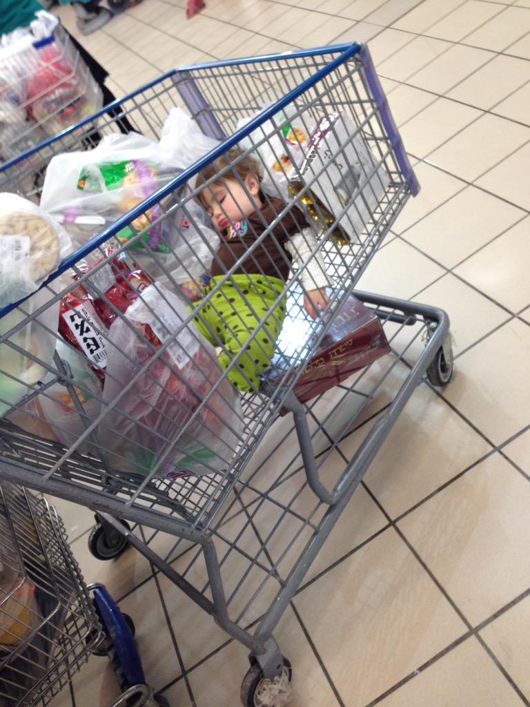 Pre-Pesach shopping at Osher Ad. Toddlers for sale.