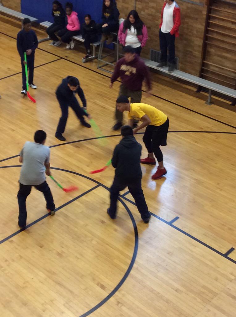 MorrillPE's tweet image. Middle school playing floor hockey as part of Gym Games