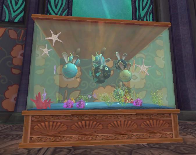 KelseyFireheart's tweet photo. This tank is full of Easter Eggy Bunny Fish. I mean it's literally full lol :D #SpringFish #EasterFish #Wizard101 http://t.co/m5GpNajbpz