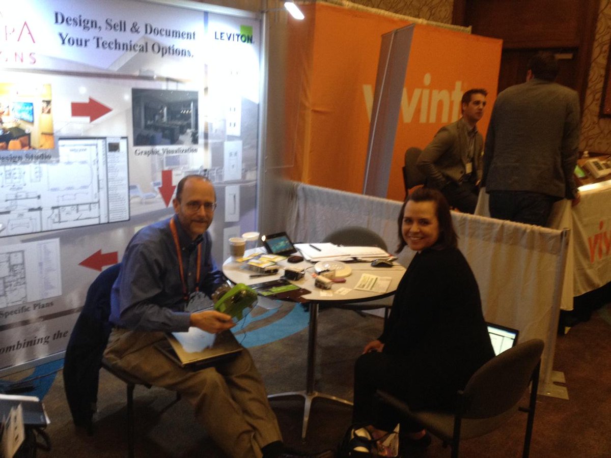 AterraDesigns's tweet photo. Snapped! Rick from @Leviton and Jennifer of @EYAHomes having a chat at our booth at @TecHomeBuilder Summit! #techome http://t.co/jakz8Rr2nE