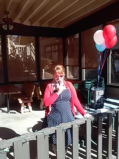 YouNeedPieDiner's tweet photo. Lori emceeing on the patio at You Need Pie Diner in Estes Park on Pi day, 3.14.15. Will u be here 4 the next Pie Walk http://t.co/BUhs1sw7pz