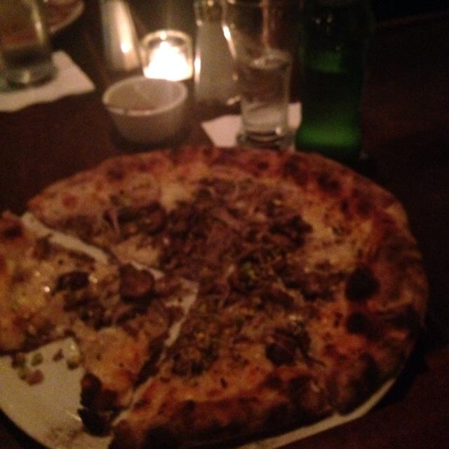 Spectacularly delicious Rosa pizza with mushrooms at the famous Pizzeria Bianco. Oh with bottled Sprite too.