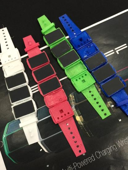 AdamBalkin's tweet photo. #SXSWi #SolCuff solar powered, device charging bracelet. http://t.co/rpULMdTttR