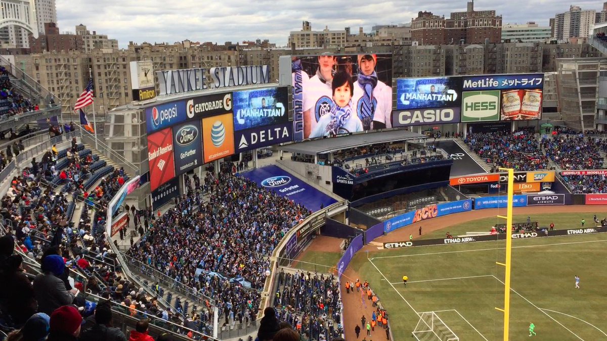 mottsquad's tweet photo. Ahimsa and Atom on the big screen at #nycfc getting to watch their hero @Guaje7Villa. Welcome to NYC! #WeAreDUSC http://t.co/0LDTa1fQIh