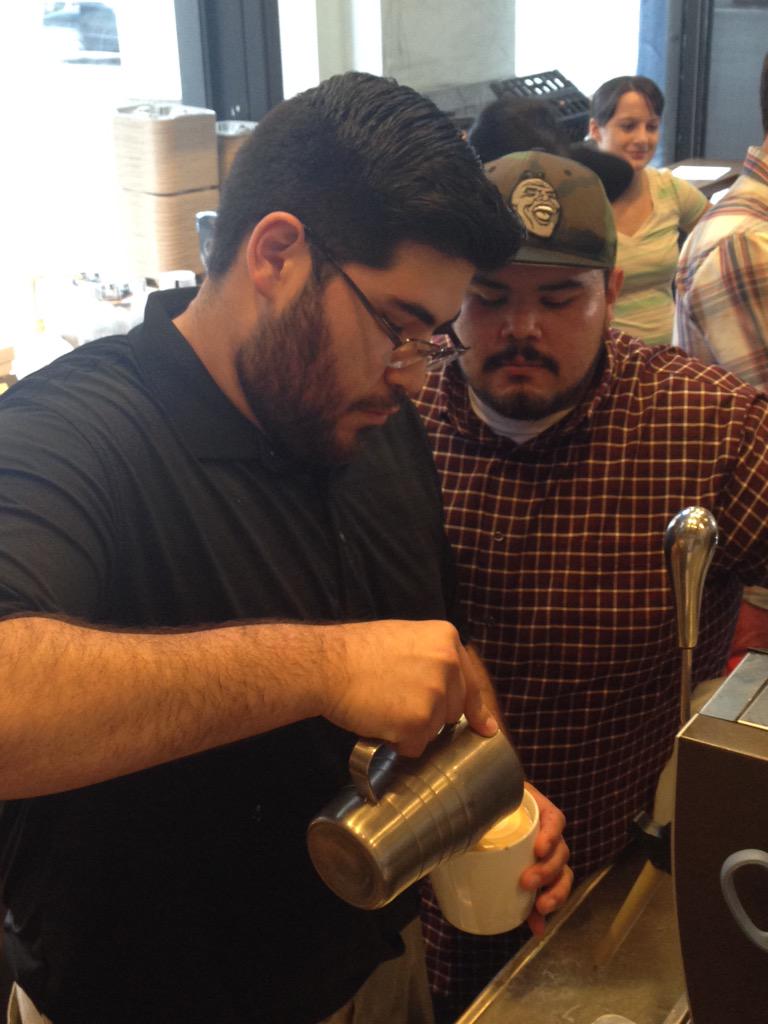 RobertTorrey's tweet photo. David looks like he's been doing this for years! The picture doesn't do it justice. #learninglatteart http://t.co/x5wLvZoeZ7