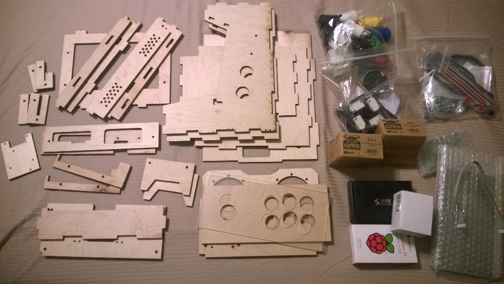 Dawlker's tweet photo. The pre-mise en place. Just need to decide on a color for my #PortaPi from @RetroBuiltGames http://t.co/xLxRQuRJGI