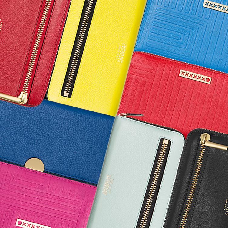We love a bright wallet! Our entire wallet collection is now 40% off: bit.ly/1wPZmsl Use code Extra40