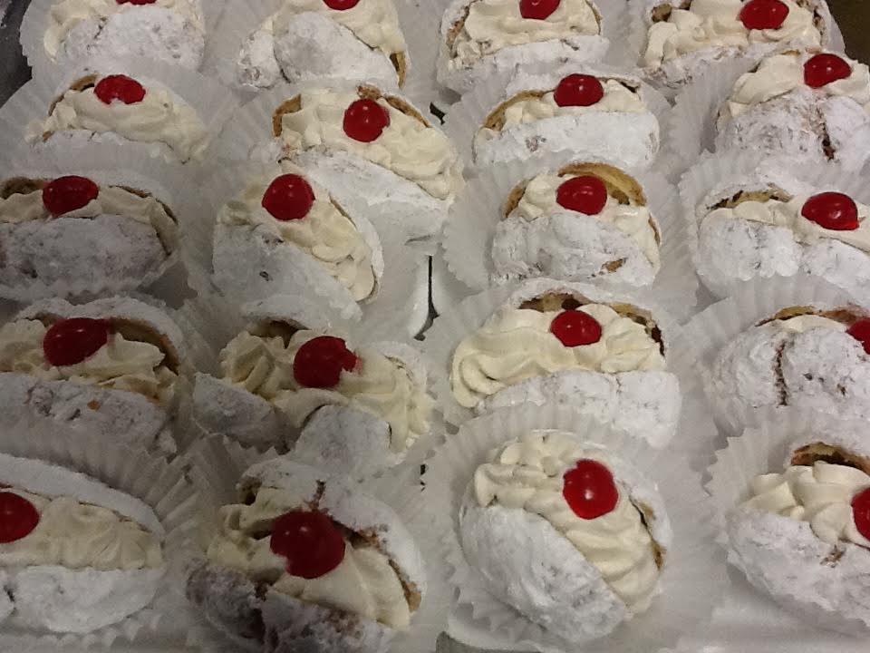 Sfingi-These lighter than air choux pastries are a St Joseph Day staple.Taste our rich orange scented &amp; ricotta cream
