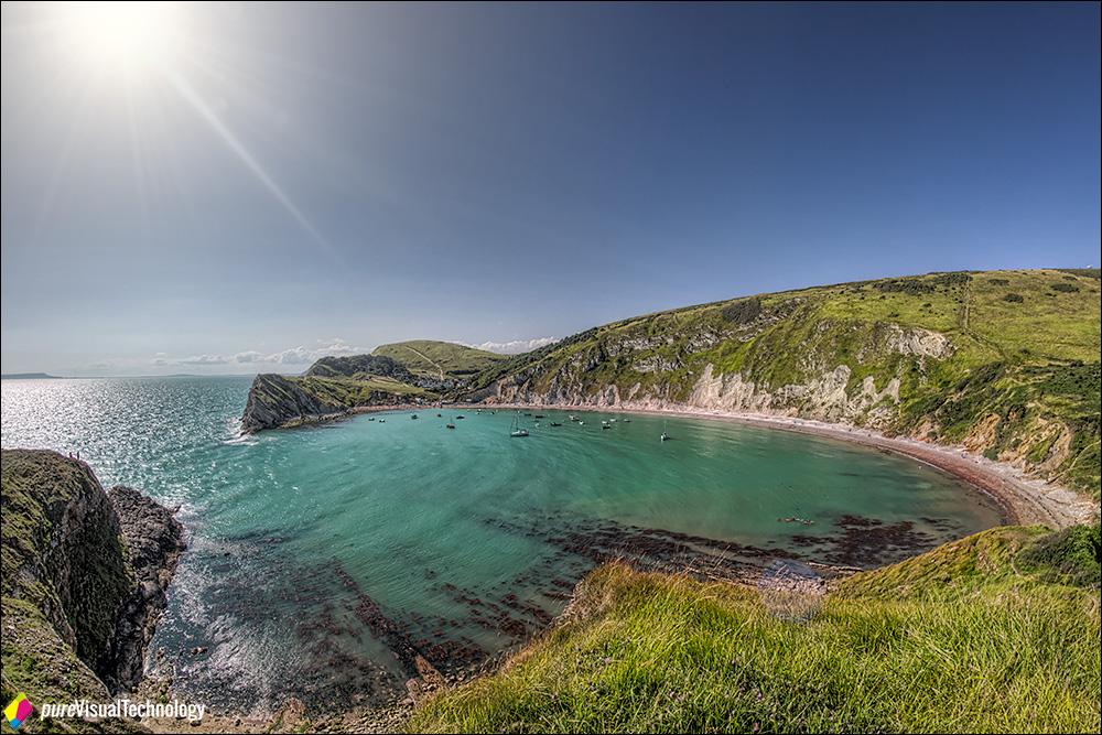 pureVT's tweet photo. #lulworthcove #sea #rock #sun #cove #dorset http://t.co/sU8ltlQrON