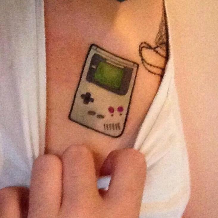 Custom gameboy from a few weeks ago! DM me to get in for March/April. $100  OFF my last 4 March openings. 💖 @lostlovetattooclub #neot... | Instagram