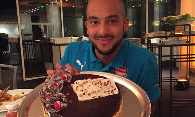 Theo Walcott shows off cake from Arsenal team-mates on Instagram as Mesut via 