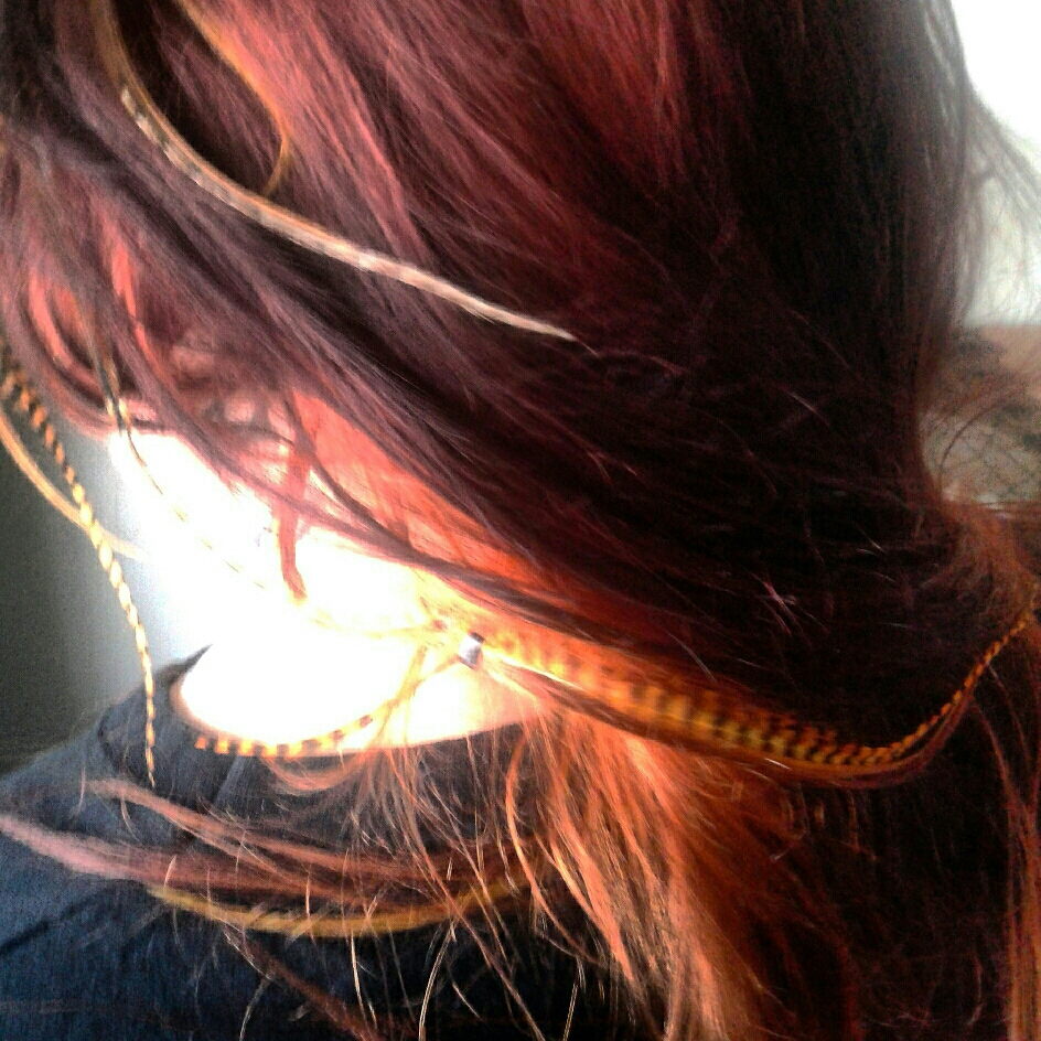 artanddisasters's tweet photo. Just entered the @snaapiq 'Best Haircut' contest my awesome fire hair with feathers. http://t.co/mnifGQFlEK