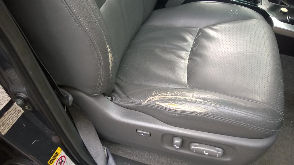 interiorrepair's tweet photo. Heavy wear and rip to leather before http://t.co/6SJgfBD367
