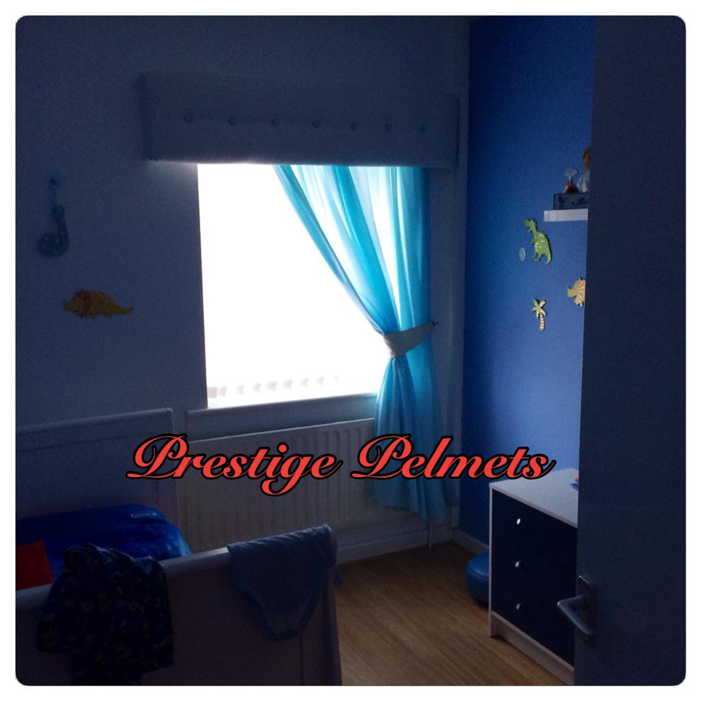 White padded pelmet with blue studs, made to measure curtain an handmade tie back #kidsbedroomideas #boyspelmets