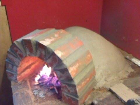 Layer two of the clay oven, this time the clay is insulated with straw! #Caribbean #streetfood #Edinburgh