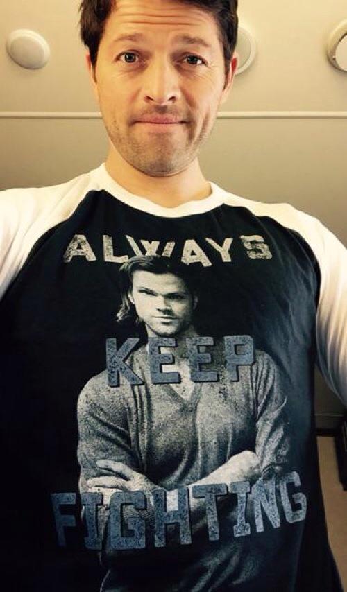 It's really hard to take a selfie that features the shirt you're wearing.