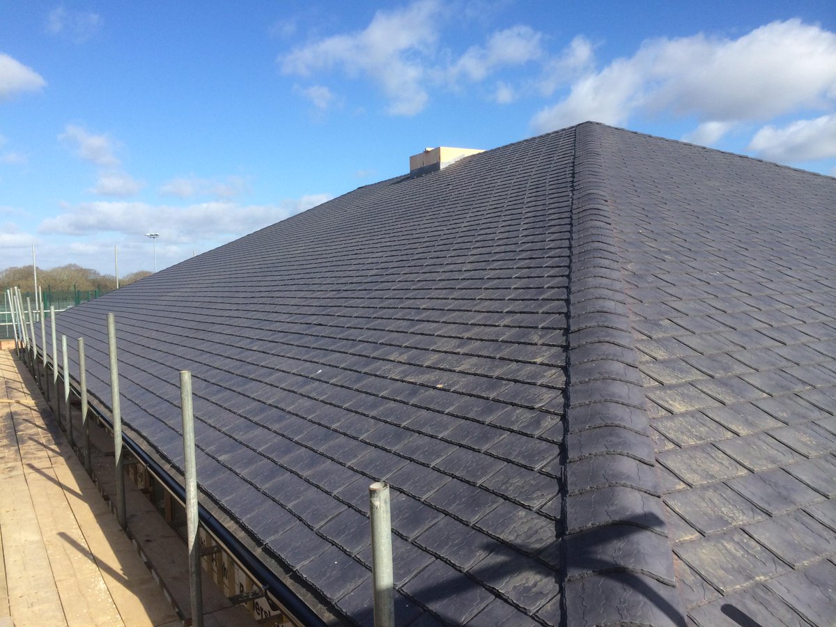 TurpinRoofing's tweet photo. The new cricket pavilion at @StBedesSchool using rubber slates supplied by @EcoDecking http://t.co/cF7eXHk167