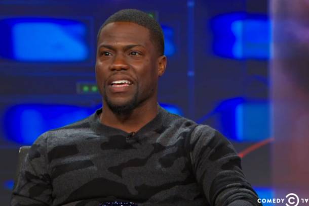 vulture's tweet photo. Watch @KevinHart4real destroy Jon Stewart with an airport-bathroom story: http://t.co/fp9Btl8aYa http://t.co/bMxtde5Ps7