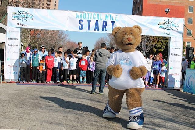 TowneBanking's tweet photo. #TBT to Sunday's Nautical Mile start, part of @OneCityMarathon festivities. #TownEBear was up for the challenge! http://t.co/q9VmykjRRy