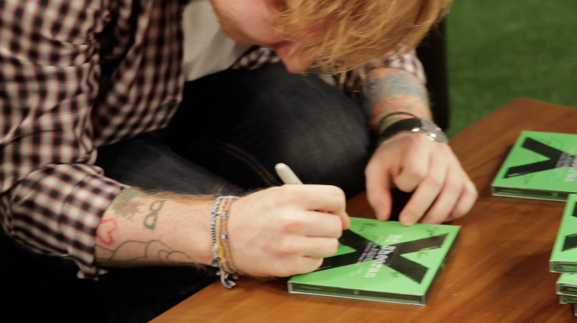 nova919's tweet photo. This is @edsheeran signing THE EXACT merch you can win tonight!
Your name + #SmallzysEdHookUp http://t.co/09C6zDmKHW