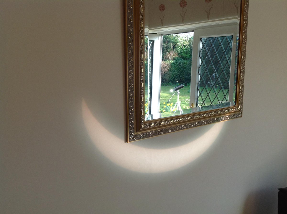 zemogle's tweet photo. My dad projected the #2015eclipse on to the wall of their house for my mum. Heโs a romantic thing! http://t.co/1Bw670M2zH