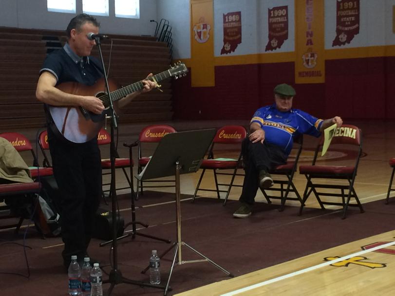 ScecinaNow's tweet photo. Irish singer-songwriter @EunanMcIntyre performs Rose of Summer about his wife to Scecina staff and students http://t.co/Rq6TWVGPKB