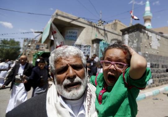 shephardm's tweet photo. Once again, sadly, @reuterspictures' Khaled Abdullah captures heart-wrenching #Yemen photos in wake of twin bombings. http://t.co/99u1OzYv0F
