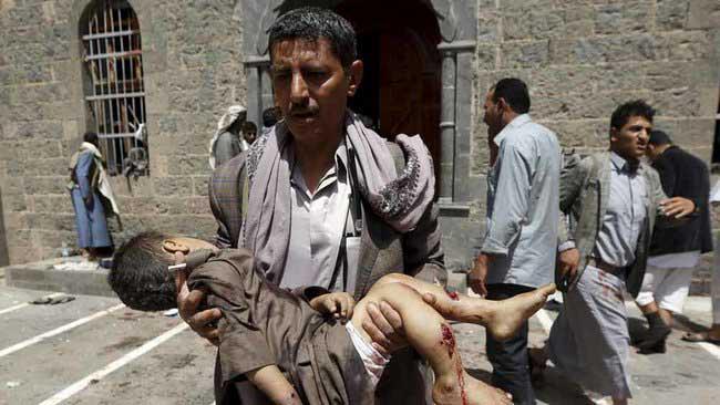 shephardm's tweet photo. Once again, sadly, @reuterspictures' Khaled Abdullah captures heart-wrenching #Yemen photos in wake of twin bombings. http://t.co/99u1OzYv0F