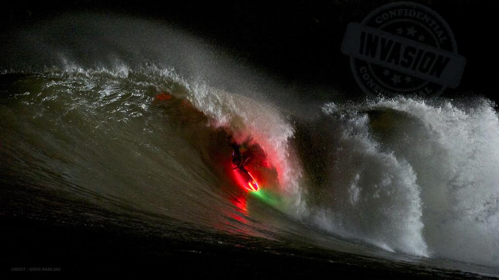 Stunning video shows people surfing at night with led surfboards and