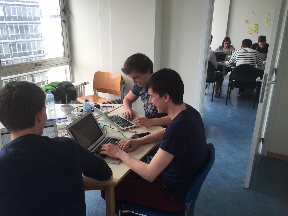 johanmijs's tweet photo. Niets dan blije gezichten, 2 van de 17 teams coden met zicht op de Boekentoren van UGent #appsforgent #hackdebib http://t.co/g3Cazkkq3s