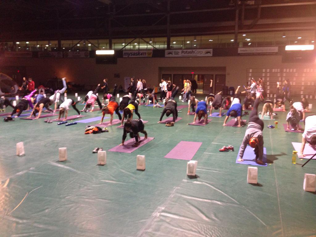 Kelsey_Chad's tweet photo. In the final stretch, a little 4:30 am Yoga. Quite a bit of energy here at the #uofrrelay2015 http://t.co/Hws0crM5Sa