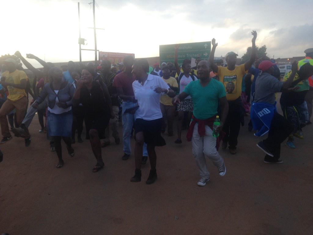 POWER987News's tweet photo. #RIPChabane ANC members marching and singing towards the venue where the funeral service will take place. http://t.co/6un4QdcTRI