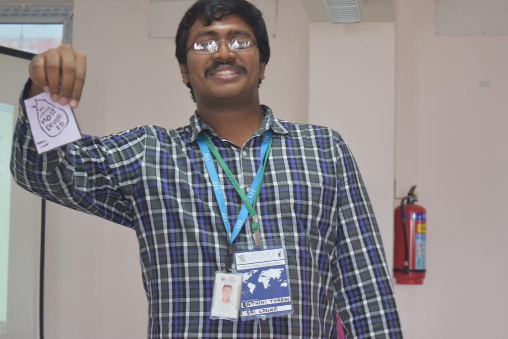 wtovitcmun15's tweet photo. Sri Lanka-d most devoted delegate, noticing minute details-like-absence of his country from ID cards #wto #VITCMUN15 http://t.co/Dx05F6qJmB